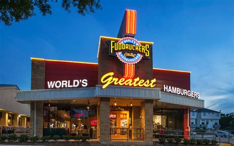 Fuddruckers restaurant - Fuddruckers promote its burgers as “fresh, never frozen," using buns baked on the premises. The restaurant chain was created in 1979 by Philip Romano, who went on to found Romano’s Macaroni Grill.